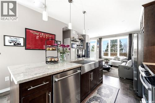 148 3229 Elgaard Drive, Regina, SK - Indoor Photo Showing Kitchen With Upgraded Kitchen