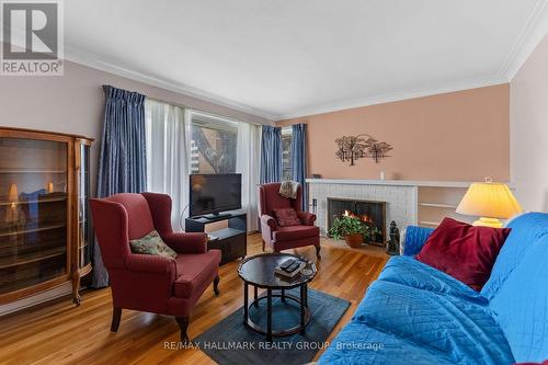 2075 Neepawa Avenue, Ottawa, ON - Indoor Photo Showing Living Room With Fireplace
