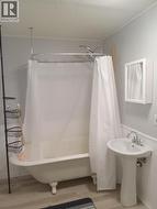 lower suite bathroom clawfoot tub - 
