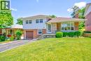 Split-level residence featuring a brick and stone facade with white siding - 31 Brodick Street, Hamilton, ON  - Outdoor With Deck Patio Veranda With Facade 