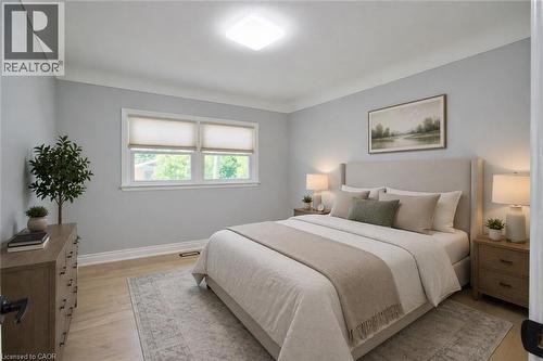 Light gray walls with white crown molding - 31 Brodick Street, Hamilton, ON - Indoor Photo Showing Bedroom