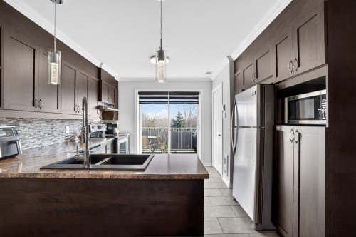 Cuisine - 125 Ch. Du Souvenir, Bois-Des-Filion, QC - Indoor Photo Showing Kitchen With Double Sink With Upgraded Kitchen