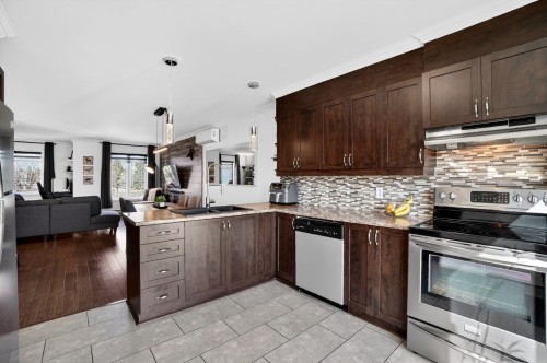 Cuisine - 125 Ch. Du Souvenir, Bois-Des-Filion, QC - Indoor Photo Showing Kitchen With Double Sink With Upgraded Kitchen