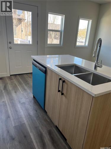 4513 Green Brooks Way E, Regina, SK - Indoor Photo Showing Kitchen With Double Sink