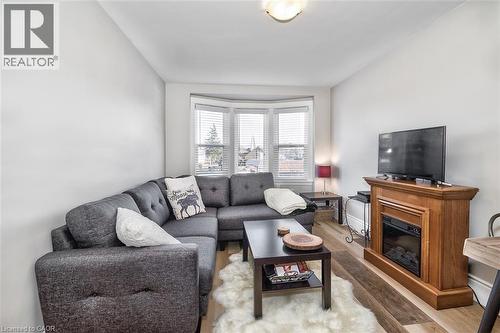 144 Ottawa Street S, Hamilton, ON - Indoor Photo Showing Living Room With Fireplace