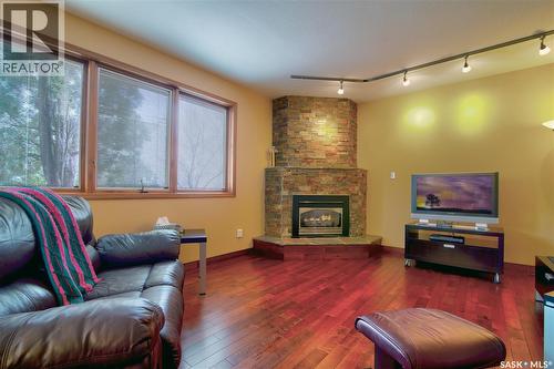 3623 Hanna Bay, Regina, SK - Indoor Photo Showing Living Room With Fireplace