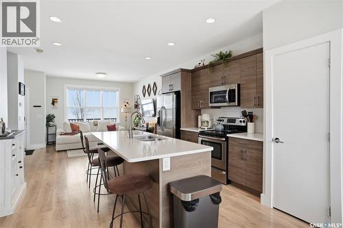122 Greyeyes-Steele Way, Saskatoon, SK - Indoor Photo Showing Kitchen With Double Sink