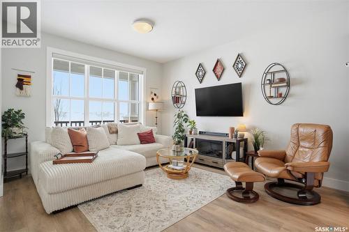 122 Greyeyes-Steele Way, Saskatoon, SK - Indoor Photo Showing Living Room