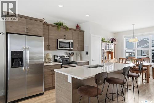 122 Greyeyes-Steele Way, Saskatoon, SK - Indoor Photo Showing Kitchen With Stainless Steel Kitchen With Double Sink With Upgraded Kitchen