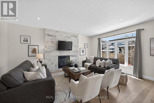 1765 Brayford Avenue, London South (South K), ON - Indoor Photo Showing Living Room With Fireplace