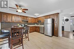 Kitchen with Quartz Countertops and S/S Appliances - 