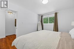 Primary Bedroom with Waterproof Laminate Flooring - 