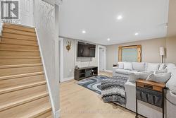 Prof. Finished Basement Adds Valuable Living Space - 