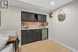 Custom Bar w/Upper & Lower Cabinetry & Wine Fridge - 