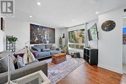 Living Room Highlighted by a Large Picture Window - 