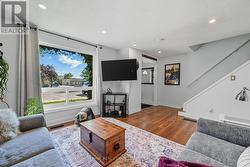 Living Room Highlighted by a Large Picture Window - 