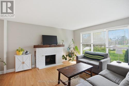 Main Floor: Living Room - 305 Stephen Street, London South (South B), ON - Indoor Photo Showing Living Room With Fireplace