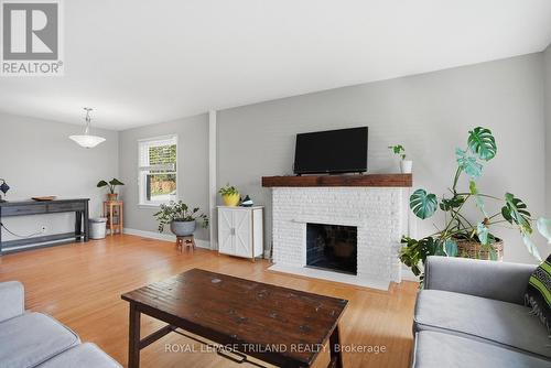 Main Floor: Living Room - 305 Stephen Street, London South (South B), ON - Indoor Photo Showing Living Room With Fireplace