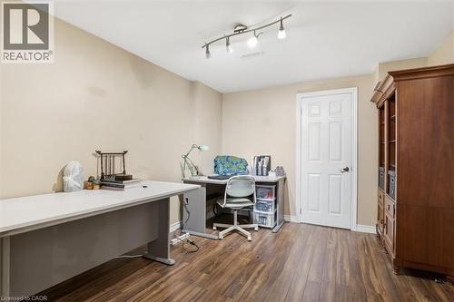 Versatile room featuring wood-finish flooring and neutral wall tones - 113 Glenecho Court, Waterloo, ON - Indoor Photo Showing Office