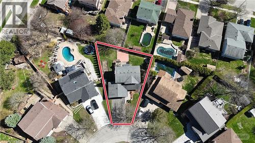 Aerial perspective showcasing a residential property with a multi-level roofline, a paved driveway, and a front yard with mature trees - 113 Glenecho Court, Waterloo, ON -  With View