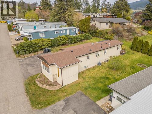 Aerial showing the home's proximity to the services at Lakewood Mall and Turtle Crossing. - 12022 Pretty Road Unit# 16, Lake Country, BC 
