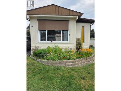 Front of the home with plants from last summer. - 12022 Pretty Road Unit# 16, Lake Country, BC 