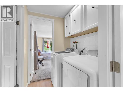 Laundry area between the bathroom and primary bedroom - 12022 Pretty Road Unit# 16, Lake Country, BC 