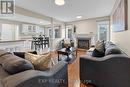 4875 John Street, Lincoln (Beamsville), ON  - Indoor Photo Showing Living Room With Fireplace 