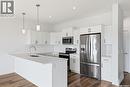 830 Kensington Boulevard, Saskatoon, SK  - Indoor Photo Showing Kitchen With Upgraded Kitchen 