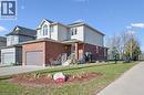 View of front of house with brick siding and driveway - 649 Doon South Drive, Kitchener, ON  - Outdoor 