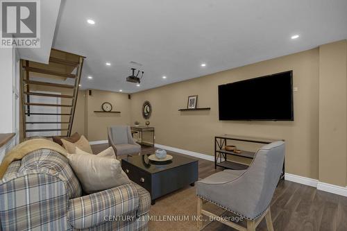 Laminate flooring and pot lights - 9610 Sideroad 5 Side Road, Erin, ON - Indoor Photo Showing Living Room
