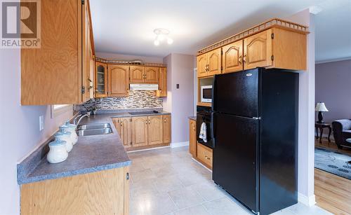 15 Greslet Place, Conception Bay South, NL - Indoor Photo Showing Kitchen With Double Sink