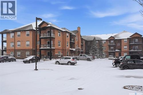 A206 103 Wellman Crescent, Saskatoon, SK - Outdoor With Balcony With Facade