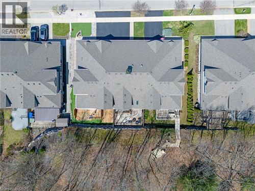Aerial perspective showcasing a property with a grey shingle roof, a paved driveway, and multiple rear decks - 227 Chestnut Hill Crescent, Kitchener, ON - 