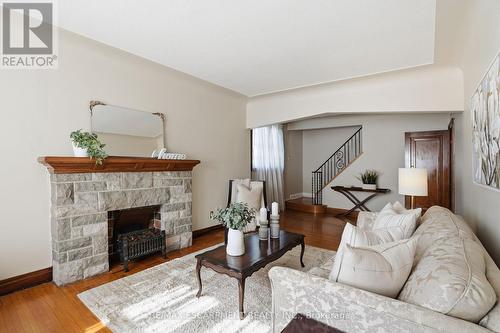 123 Longwood Road N, Hamilton, ON - Indoor Photo Showing Living Room With Fireplace