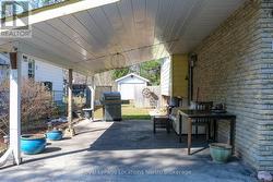 12' x 23' carport & easy access to 12'x 20' garage - 
