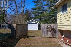 Gate to fenced rear yard & 12' x 20 detached garag - 