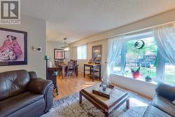 Open-concept living room and dining area - 