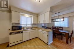 Kitchen & eating area nice & close to one another - 