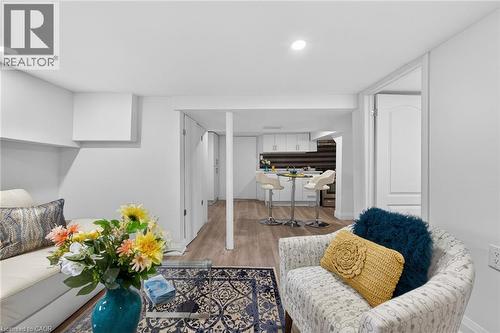 Open-concept interior featuring light wood-finish flooring - 36 Mahony Avenue, Hamilton, ON - Indoor