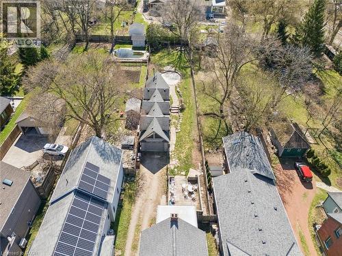 Aerial perspective showcasing multiple properties with varied architectural styles - 115 Allen Street E, Waterloo, ON - Outdoor