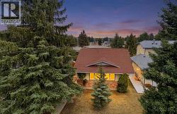 107 Woodbine Boulevard SW  Calgary, AB T2W 3W8