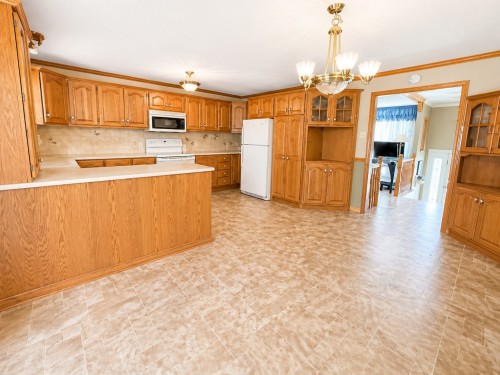 Bedroom - 5 Rue Jean-Yves, Montréal (L'Île-Bizard/Sainte-Geneviève), QC - Indoor Photo Showing Kitchen