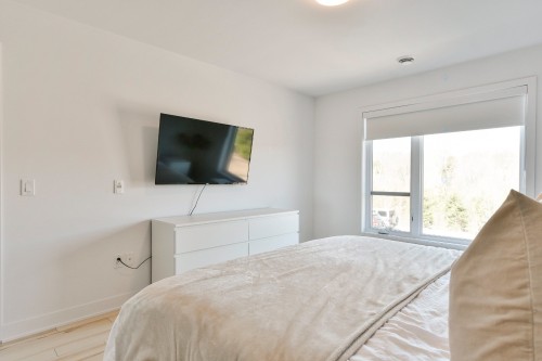 Chambre à coucher principale - 208-10075 Rue De L'Épervier, Mirabel, QC - Indoor Photo Showing Bedroom