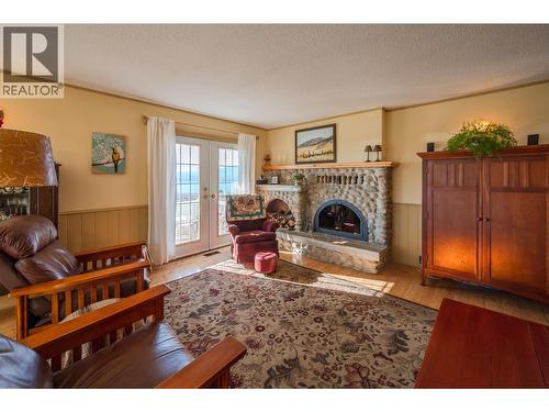4550 Gulch Road, Naramata, BC - Indoor Photo Showing Living Room With Fireplace