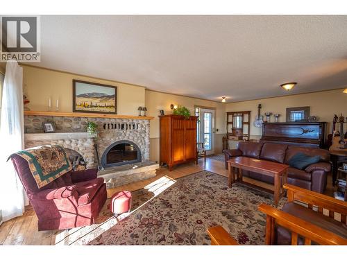 4550 Gulch Road, Naramata, BC - Indoor Photo Showing Living Room With Fireplace