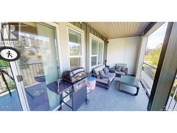 large covered deck with bbq - 