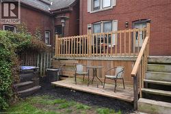 Multilevel wood decking with railing and steps - 