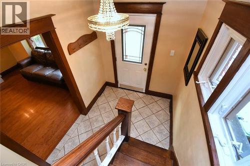 Foyer with ceramic tile flooring and a decorative chandelier - 522 Aberdeen Avenue, Hamilton, ON - Indoor Photo Showing Other Room