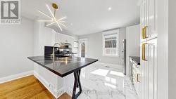 402 WOODBINE AVENUE Toronto, ON M4L 3P6